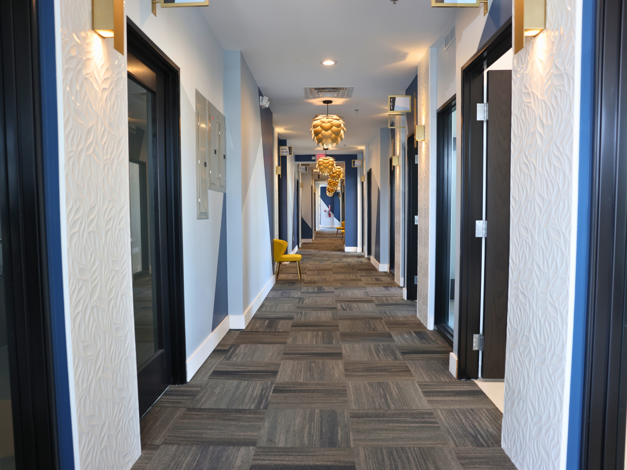 Clean and stylish hallway at Broadway Salon Studios Livonia